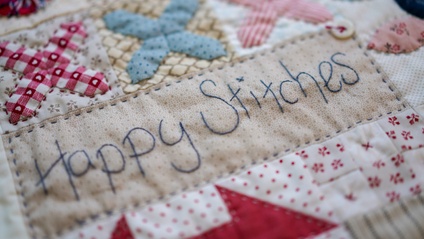 Product image for Happy Stitches Sampler Quilt PDF Pattern